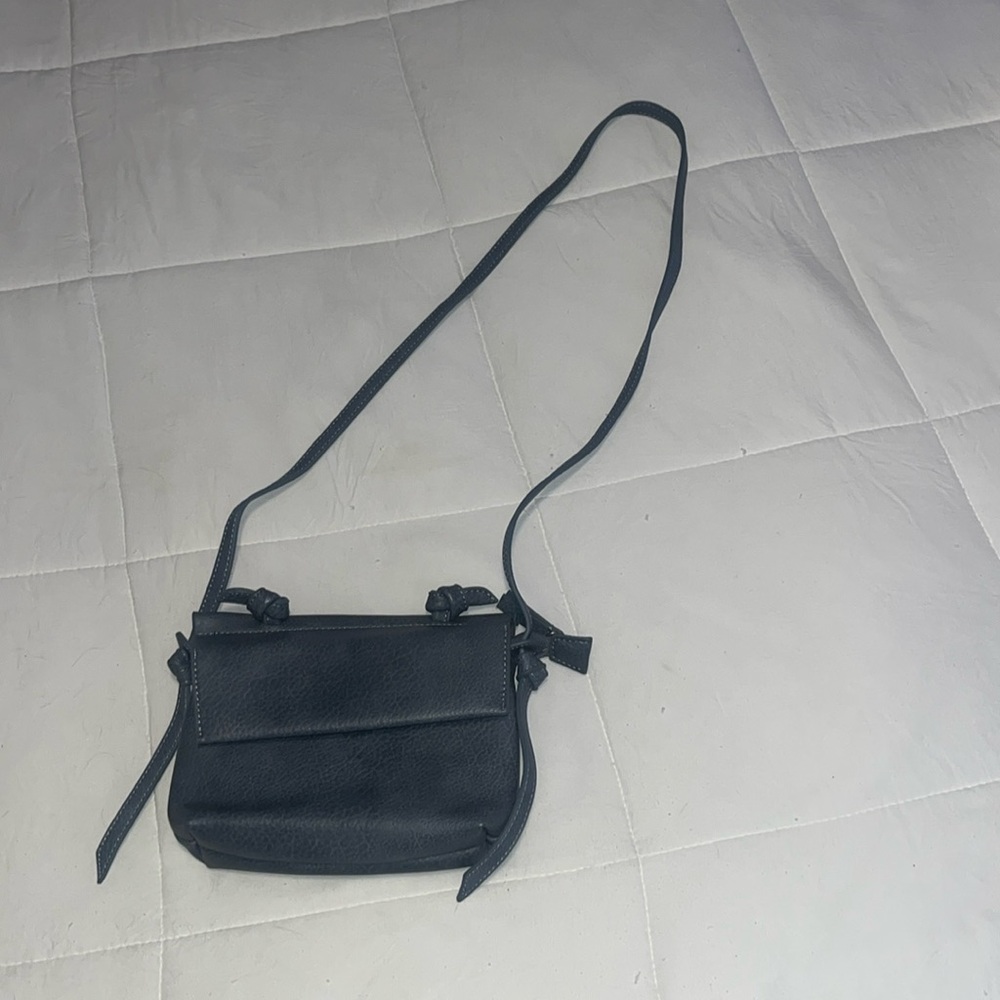 By Anthropologie blue vegan leather small crossbody bag 
EUC! Like new